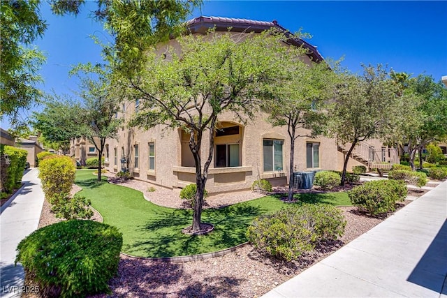 8985 S Durango Dr Unit 1154, Las Vegas, NV 89113 - view of front of property featuring stucco siding and a front yard
