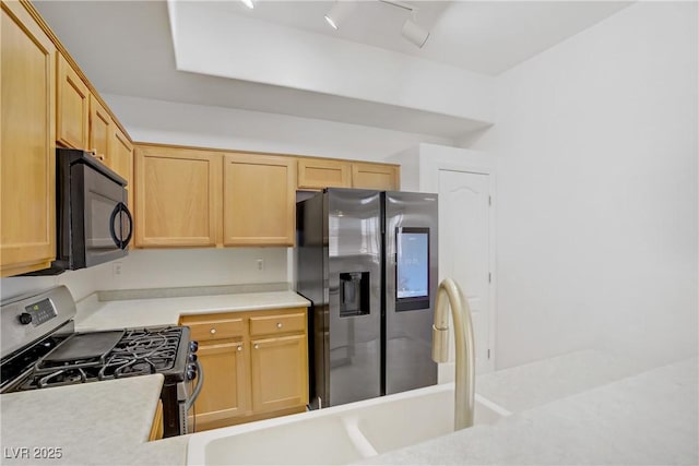 8985 S Durango Dr Unit 1154, Las Vegas, NV 89113 - kitchen with appliances with stainless steel finishes, light countertops, and light brown cabinets