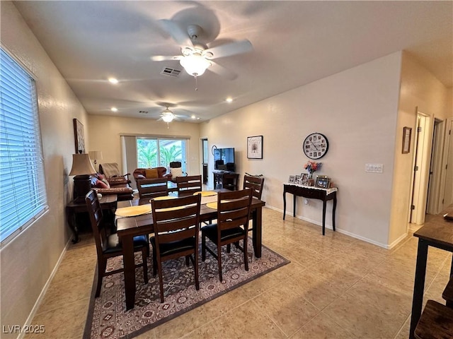 2558 Divine Sky Dr, Henderson, NV 89044 - dining space with a ceiling fan, light tile patterned floors, and baseboards