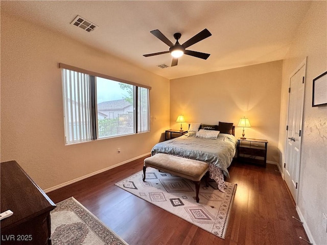 2558 Divine Sky Dr, Henderson, NV 89044 - bedroom featuring wood finished floors, baseboards, and ceiling fan
