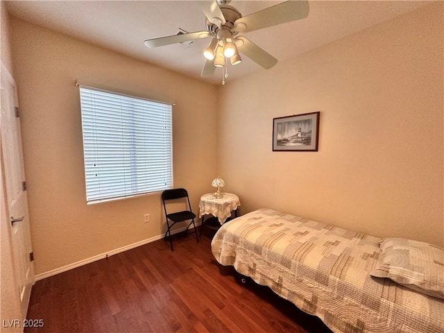 2558 Divine Sky Dr, Henderson, NV 89044 - bedroom with wood finished floors, baseboards, and ceiling fan