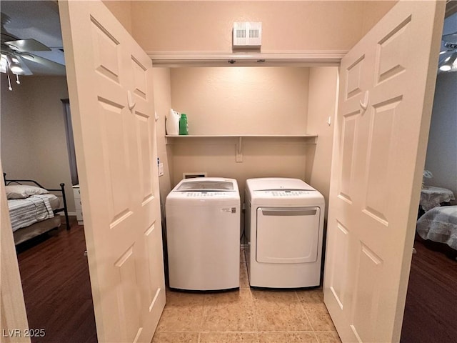 2558 Divine Sky Dr, Henderson, NV 89044 - washroom featuring ceiling fan and washer and clothes dryer