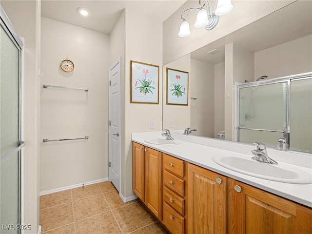 2558 Divine Sky Dr, Henderson, NV 89044 - bathroom with double vanity and a shower stall
