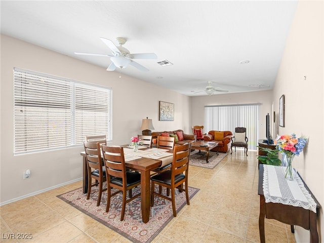 2558 Divine Sky Dr, Henderson, NV 89044 - dining space featuring a ceiling fan and light tile patterned floors