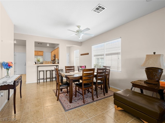 2558 Divine Sky Dr, Henderson, NV 89044 - dining room featuring ceiling fan and baseboards