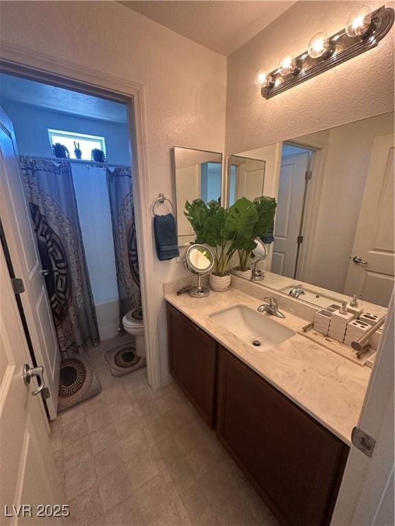 369 Stone Fly Rd, North Las Vegas, NV 89032 - bathroom featuring toilet, vanity, and curtained shower