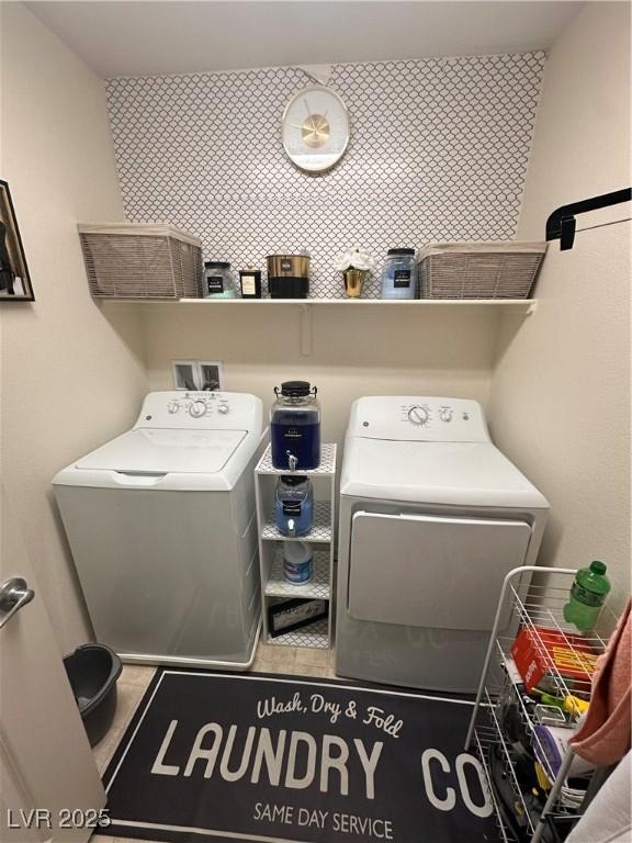 369 Stone Fly Rd, North Las Vegas, NV 89032 - laundry area with washing machine and clothes dryer