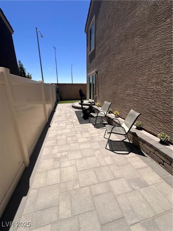 369 Stone Fly Rd, North Las Vegas, NV 89032 - view of patio featuring a fenced backyard