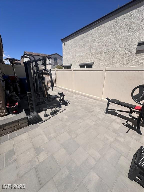 369 Stone Fly Rd, North Las Vegas, NV 89032 - view of patio / terrace with fence