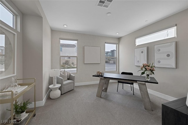 office with carpet floors, healthy amount of natural light, baseboards, and recessed lighting