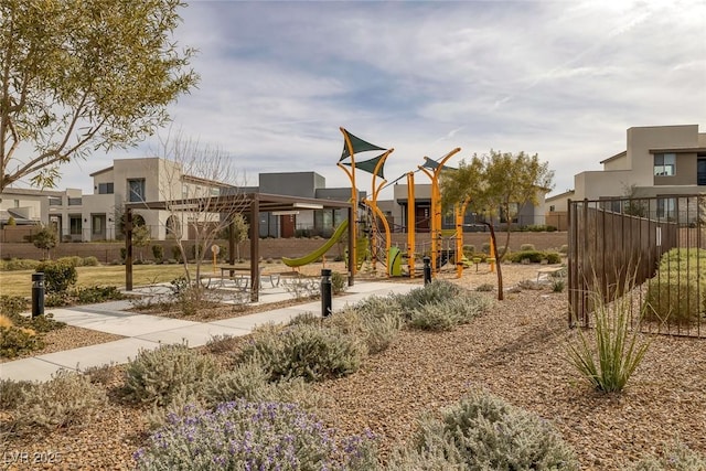 community jungle gym with fence