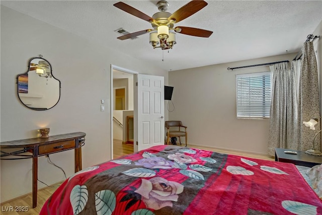 9552 Wooden Pier Way, Las Vegas, NV 89117 - bedroom with wood finished floors and ceiling fan