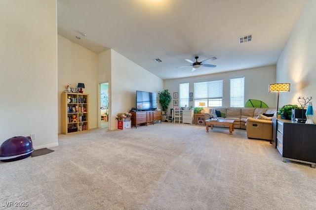 8137 Cape Flattery Ave, Las Vegas, NV 89147 - living area with light colored carpet, a ceiling fan, and lofted ceiling