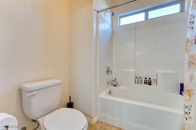 8137 Cape Flattery Ave, Las Vegas, NV 89147 - full bath featuring toilet, shower / washtub combination, tile patterned floors, and baseboards