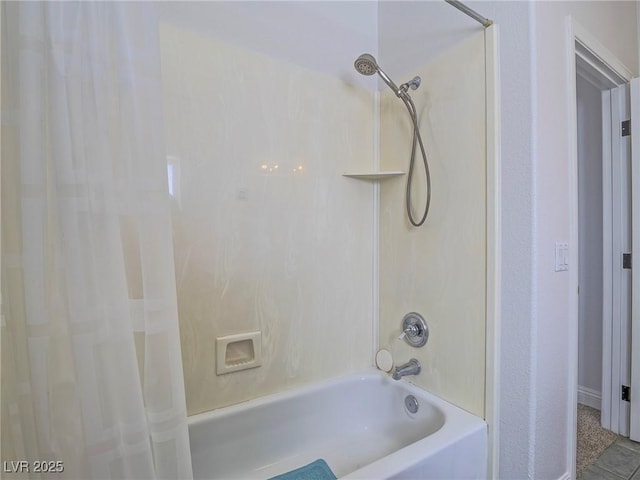 bathroom with shower / tub combo with curtain