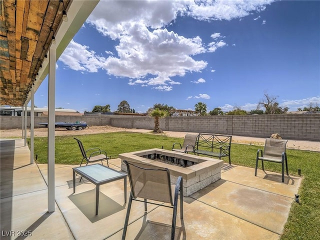 view of patio featuring an outdoor fire pit