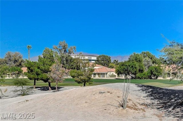 7460 Desert Flame Ct, Las Vegas, NV 89149 - view of community featuring a lawn