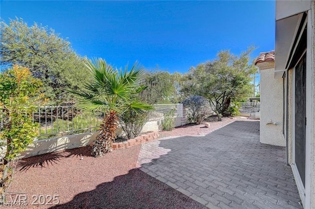 7460 Desert Flame Ct, Las Vegas, NV 89149 - fenced backyard with a patio area