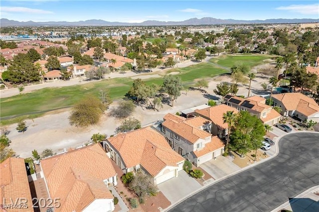 7460 Desert Flame Ct, Las Vegas, NV 89149 - aerial view of residential area with a local golf course and a mountain backdrop