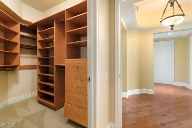 2857 Paradise Rd Unit 802, Las Vegas, NV 89109 - walk in closet with light wood-style flooring