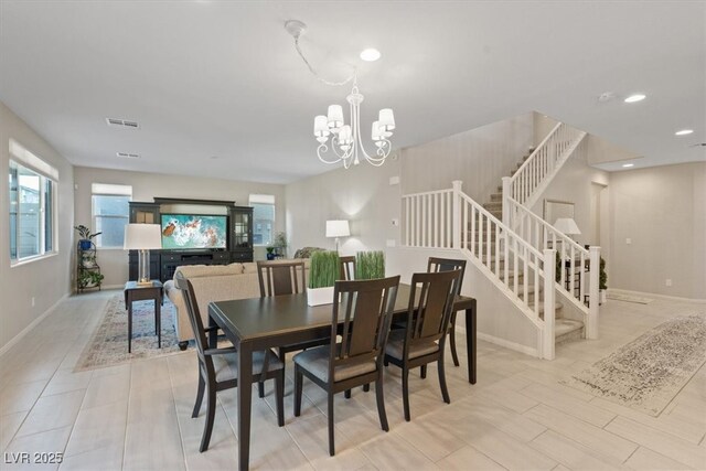 10057 Matter Overlook Dr, Las Vegas, NV 89178 - dining room with a chandelier, stairs, baseboards, and recessed lighting