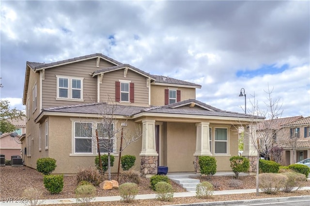 3237 Mist Effect Ave, Henderson, NV 89044 - view of front of house with stucco siding and a tiled roof