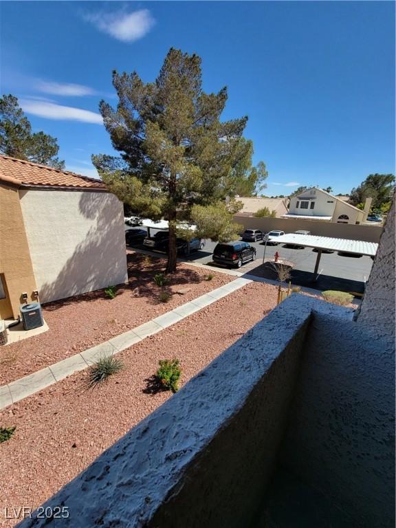 3151 Soaring Gulls Dr Unit 2101, Las Vegas, NV 89128 - view of yard featuring a balcony