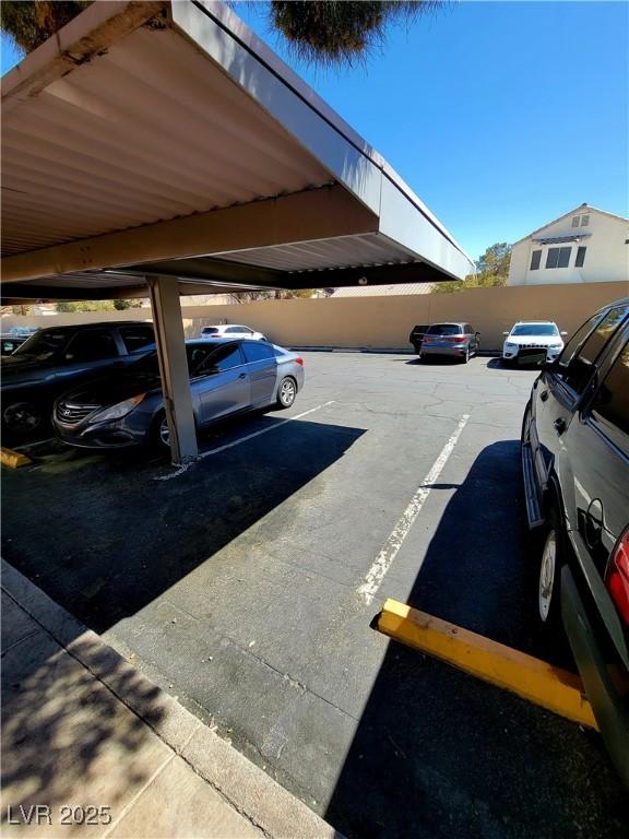3151 Soaring Gulls Dr Unit 2101, Las Vegas, NV 89128 - view of partially covered parking lot
