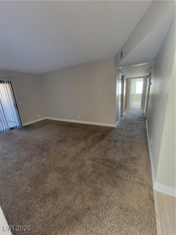 3151 Soaring Gulls Dr Unit 2101, Las Vegas, NV 89128 - carpeted spare room featuring baseboards