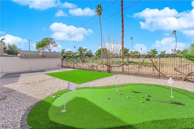 2160 Pueblo Cir, Las Vegas, NV 89169 - view of yard featuring a putting area and fence