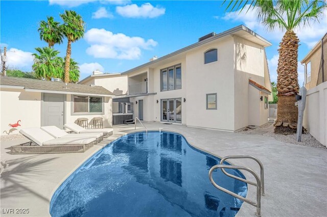2160 Pueblo Cir, Las Vegas, NV 89169 - outdoor pool with french doors, a patio, and fence