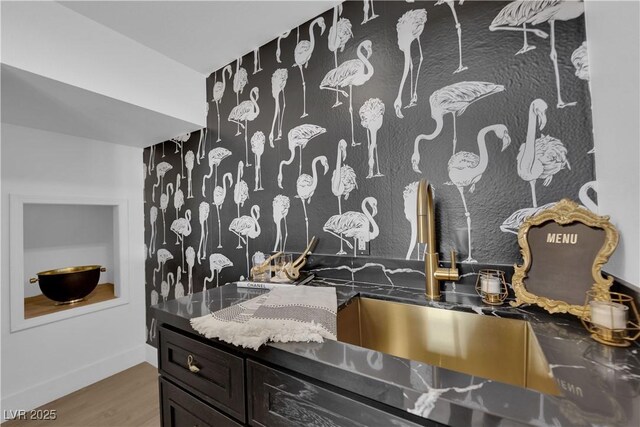 2160 Pueblo Cir, Las Vegas, NV 89169 - detailed view of wood finished floors, a sink, and baseboards