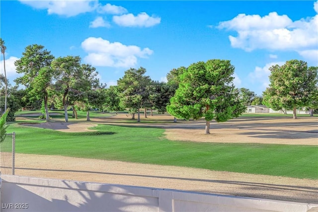 2160 Pueblo Cir, Las Vegas, NV 89169 - view of property's community with view of wooded area, a lawn, and golf course view