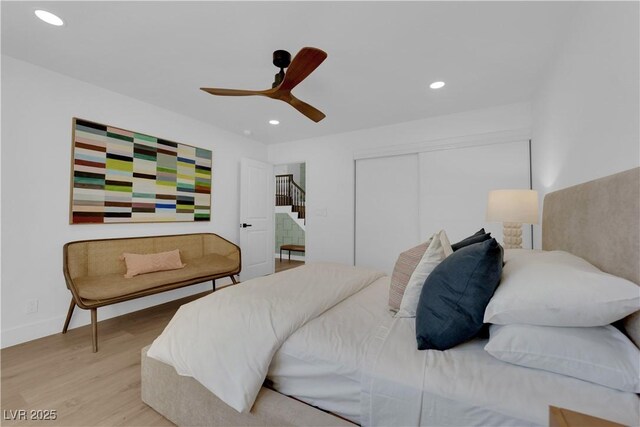2160 Pueblo Cir, Las Vegas, NV 89169 - bedroom featuring wood finished floors, recessed lighting, a closet, a ceiling fan, and baseboards