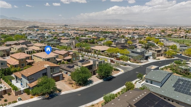 aerial view of residential area with mountains