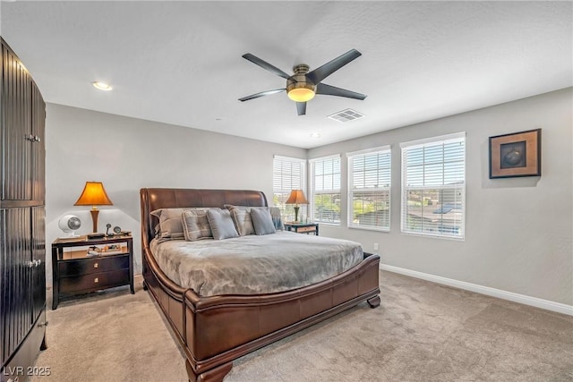 bedroom with light carpet, baseboards, a ceiling fan, and recessed lighting