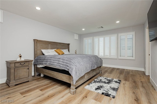 8095 Carpenter Creek Ave, Las Vegas, NV 89113 - bedroom with light wood-type flooring, baseboards, and recessed lighting