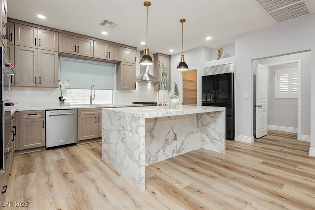 8095 Carpenter Creek Ave, Las Vegas, NV 89113 - kitchen with dishwasher, built in refrigerator, a sink, light wood-type flooring, and recessed lighting