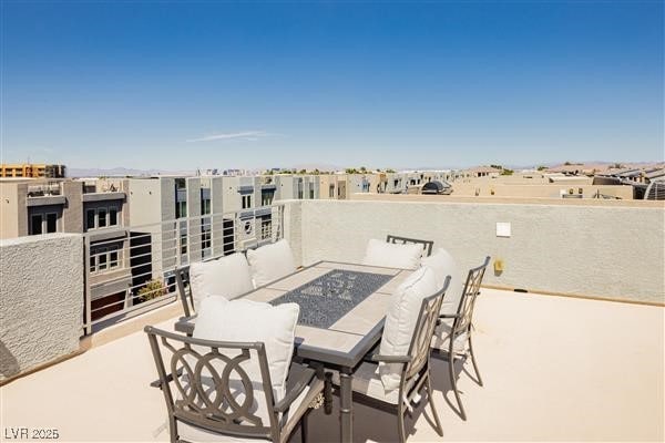 8095 Carpenter Creek Ave, Las Vegas, NV 89113 - view of patio / terrace with a balcony