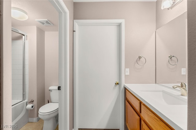 3125 N Buffalo Dr Unit 1103, Las Vegas, NV 89128 - bathroom with vanity, toilet, and bath / shower combo with glass door
