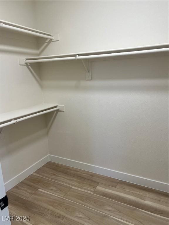 177 Rocky Star St, Henderson, NV 89012 - walk in closet with wood finished floors
