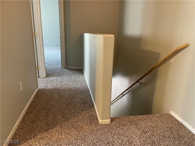 9333 Leaping Deer Pl Unit 103, Las Vegas, NV 89178 - hallway featuring an upstairs landing, carpet flooring, and baseboards
