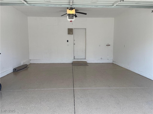 9333 Leaping Deer Pl Unit 103, Las Vegas, NV 89178 - garage featuring ceiling fan, electric panel, and a garage door opener