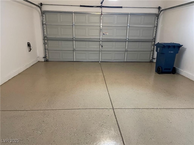 9333 Leaping Deer Pl Unit 103, Las Vegas, NV 89178 - garage featuring baseboards