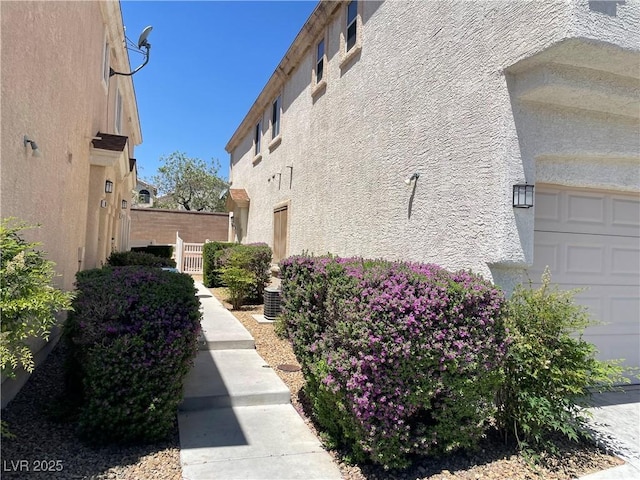 9333 Leaping Deer Pl Unit 103, Las Vegas, NV 89178 - view of community with a garage