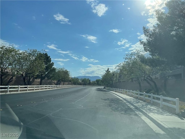 9333 Leaping Deer Pl Unit 103, Las Vegas, NV 89178 - view of asphalt road with a mountain view