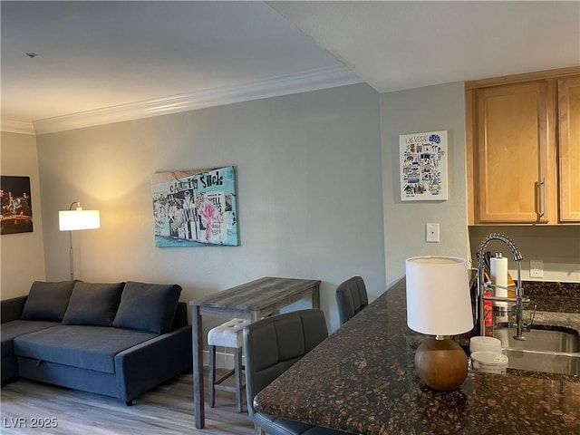 260 E Flamingo Rd Unit 228, Las Vegas, NV 89169 - living area with wood finished floors and ornamental molding
