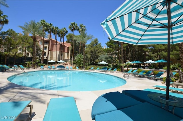 260 E Flamingo Rd Unit 228, Las Vegas, NV 89169 - community pool featuring a patio