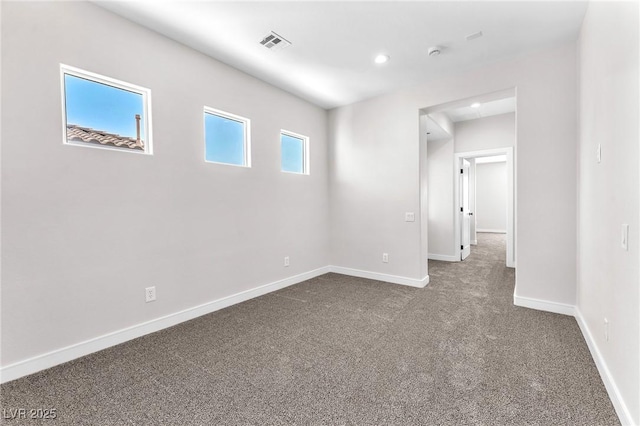 10345 Howling Coyote Ave, Las Vegas, NV 89135 - unfurnished room featuring dark carpet, baseboards, and recessed lighting