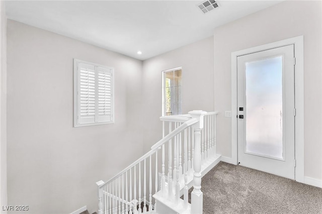 10345 Howling Coyote Ave, Las Vegas, NV 89135 - stairs with carpet floors and baseboards